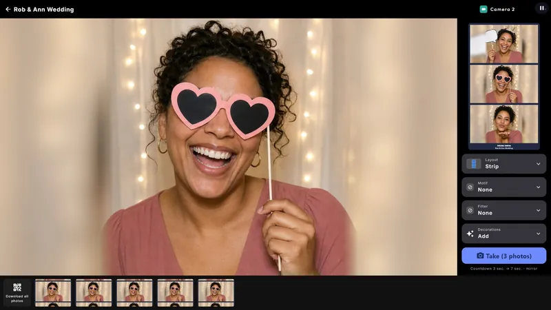 The photo booth on screen, ready to take a strip of three photos